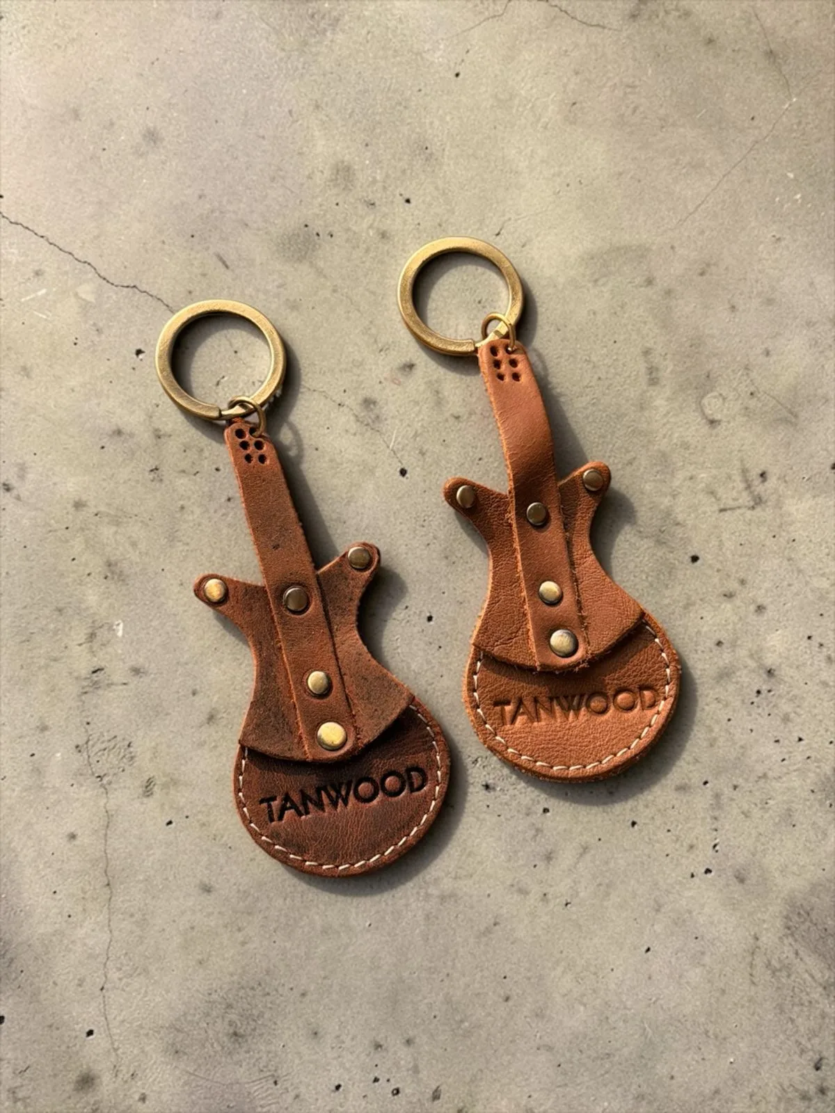 WhatsApp Image 2026-03-02 at 11.36.21 AM (1) TANWOOD LEATHER MINI Guitar - Keychain - Image 1